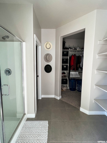 Owners shower/walk-in closet