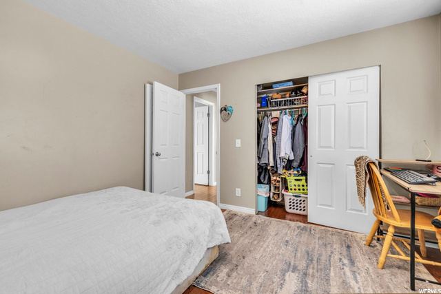 bedroom featuring hardwood floors