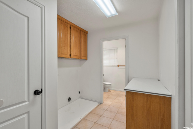 Laundry room off of kitchen