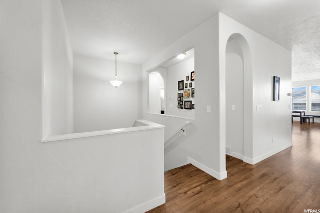 Hallway to 3 additional bedrooms on the main floor
