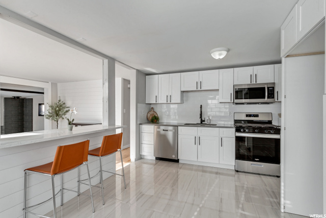 1003 E SERPENTINE WAY, Sandy UT 84094