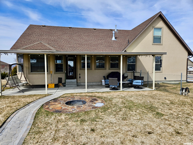 Rear View w/Covered Patio & Fire Pit