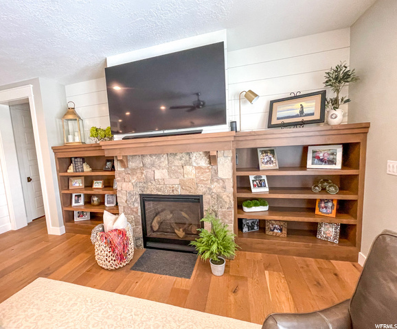 Natural Stone Fireplace & Alder Built-Ins