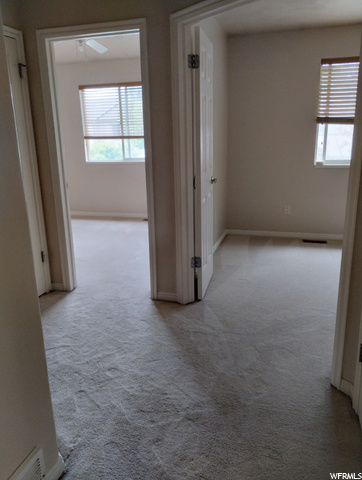 Hallway to 2 additional bedrooms