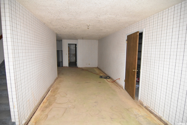 Basement Hall with putting green cups
