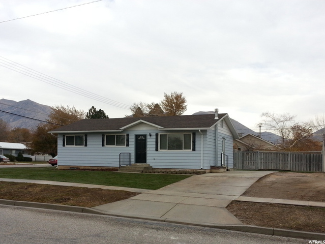 Big wide lot with fenced back yard