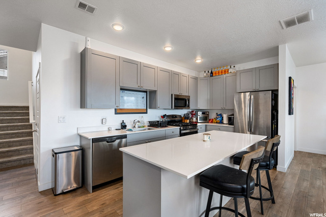 Huge Island with Quartz Counter Tops