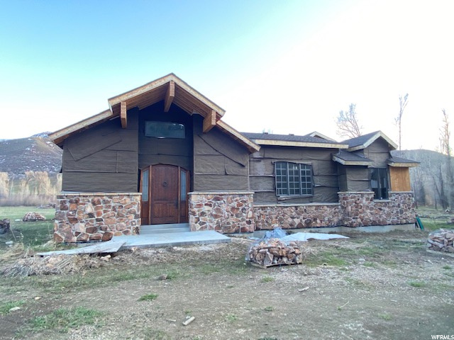 Rare opportunity to take on this building project and make it your dream home. Located along the chalk creek river with stunning mountain views. This property is under construction and includes an extra building lot! Framed for 3 bedrooms 2.5 baths.  It has power stubbed to the lot, and a well drilled. The home is approved for a septic system, but it is not installed. Plans included. All framed and ready for adding your choice of radiant heat and finishes. The crawl space is 5ft, with concrete floor and walls. Some finish items are available including but not limited to alder interior doors, plumbing and lighting fixtures, trim pieces etc. The nearly 800 sq ft, detached garage is wired with an opener and storage space above that has potential for a studio apartment.   Square footage figures are provided as a courtesy estimate only and were obtained from building plan design company.  Buyer is advised to obtain an independent measurement.