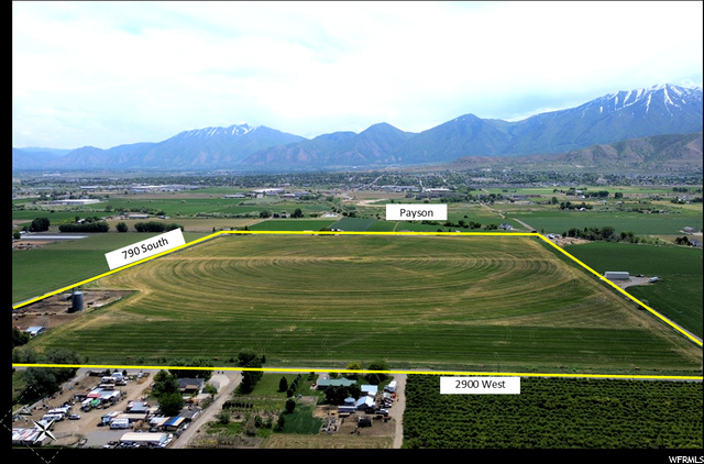 100.84 acres in the growth path of Payson City, Utah. Zoned A-5-H (Annexation Holding Zone) in Payson City. Parcel# 29:009:0023 (2022 taxes: $1,412). 206.42 shares of Strawberry Valley Project water through Highline Canal, CUP water (rented), & Water Right: 51-1254. 94 acres irrigated with a Zimmatic pivot & flood irrigation. Farm yields: Silage corn: 24 ton/acre, Alfalfa: 5-7 ton/acre. Utilities: power, well water, dominion gas, & septic sewer. Improvements include a trailer, sheds, & corrals. 13 miles southwest of Provo, Utah. 46 miles south of Salt Lake City, Utah.