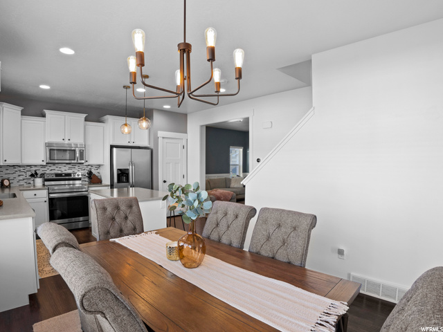 View of hardwood floored dining space