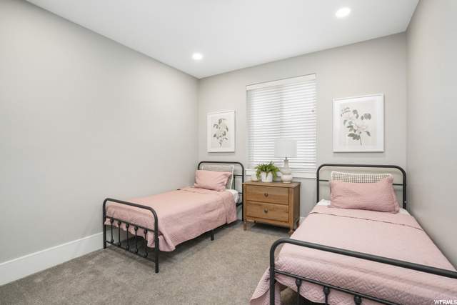 View of carpeted bedroom