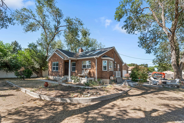 Charming Bungalow on rarely available  HALF ACRE  Secluded horse Property! Incredible location! Completely Updated.  Brand new carpet just installed in basement!  Vaulted Ceilings, skylights. Wet Bar in Basement. Custom Built Shelves.  Endless possibilities with this home and Land!