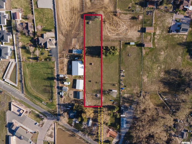 1.44 acres with gorgeous views perfect for your Dream Home! This property has room pools and sports courts and so much more.  The front property is also for sale. All together the property is 1.99 acres.