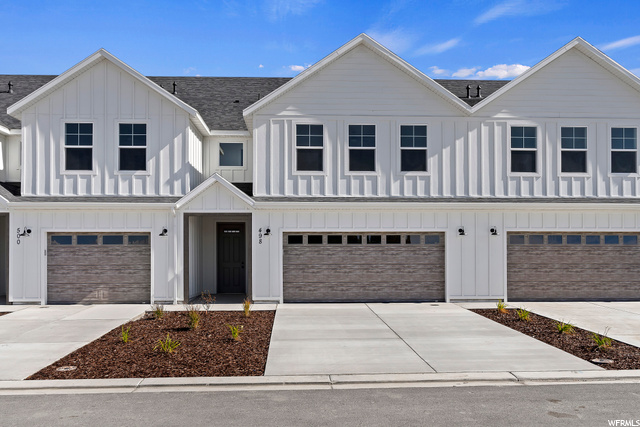 Ask about our 5.99% rate incentive*! New Construction QMI! 2-story midrow w/ 2-car garage (ask about our extra large 1-car garage floor plan!). 1 GB fiber internet included in HOA. W/D/F included!  Home built w/ many upgrades: walk-in pantry, farm sink, quartz counters, LVP, upgraded carpet. Plan has spacious loft, FULL SIZE laundry room, DOUBLE primary walk-in closet, 9' ceilings, & tons of storage. Privacy fenced backyard, private porch. More than ample parking for the community. Quiet, small neighborhood feel. Open House at Model Home: 453 W 490 N. *6.45% APR, terms and conditions apply.