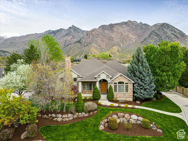 Nestled in Alpine, Utah, this 5,433 sq. ft. home on a 0.46-acre lot offers luxurious living with 5 bedrooms, 4 baths, and an open-concept kitchen-family room. Features include a cowboy-themed bar, high ceilings (10-12 ft upstairs, 9 ft in basement), and 2x6 exterior walls for enhanced insulation. The residence also boasts a new furnace and AC unit (2023), a spacious master suite with a large walk-in closet, and a private backyard with mature trees, a water feature, gazebo, fire pit, and in-ground trampoline. Enjoy a 3-car garage with extra storage, a second laundry in the basement, and a quiet neighborhood close to the mountains, making this home a peaceful retreat.