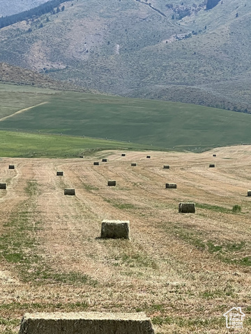 Property view of mountains with a rural view