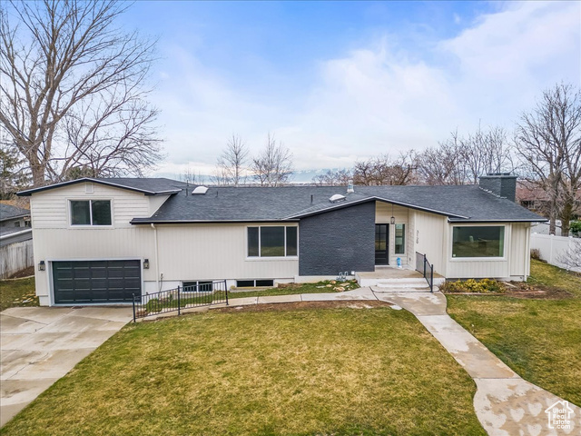 STUNNING remodel inside & out in the coveted Indian Hills neighborhood. ENTERTAINMENT galore!  HUGE galley kitchen boasts a massive island & pantry. New master bathroom has a double-vanity, a stand-alone soaker tub & skylight. FULL MIL apartment w/separate entrance in basement! Five minutes from BYU, Provo Temple, the mountains, walking trails, & more!