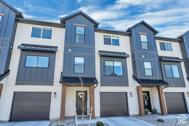BUY THIS HOME AND GET AN INTEREST RATE AS LOW AS 4.625%! SAVE THOUSANDS! 4.625% year one of FHA 2/1 Buydown or 5.25% year one of Conventional Buydown! Beautiful townhome, extremely well  cared for, feels like new. Lots of upgrades you won't see in neighboring units such as fireplace buildout, high-end lighting fixtures, and ceiling fans. Large grassy area out back door for kids and furry friends to get the wriggles out and soak up some sunshine. Very centrally located with easy access to I-15 and restaurants and shops close by. Garage is double deep and big enough to fit a full-size truck + another vehicle!