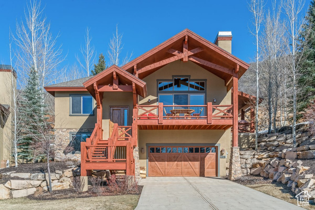 THIS HOME IS FULLY FURNISHED AND TURN-KEY!  Located at the top of Turnberry Woods development, this home has views of the Heber Valley and Wasatch Mountain State Park as your backyard. Hiking and mountain bike trails are right out your door.  Upon entering the fully furnished lodge inspired home, the main floor welcomes you with hickory hardwood floors and an open concept living area with a 20 foot high,  beamed ceiling and fireplace.  The kitchen has granite counter tops, a 6 burner natural gas cooktop, new refrigerator and new dishwasher.    The primary bedroom is spacious with great views, newly remodeled bathroom and a walk-in closet.  The downstairs has natural copper quartzite tile in the landing, laundry room and bathroom.  The two carpeted bedrooms have large windows and spacious closets.  The bathroom has dual sinks and bath tub/shower combination.  Plenty of storage space in coat closet next to built-in bench and large closet under the stairs.  The loft overlooks the living room and has an office/bedroom with a full bathroom.    All the doors, cabinets and trim are made from stunning knotty alder wood.  The two car(oversized) garage has plenty of cabinets and shelves for storage.  This home boasts two outdoor covered spaces: a deck on the front with amazing views of the Heber Valley and private side porch with a natural gas fire pit and an Arctic Spa hot tub.  Come join the friendly Turnberry Woods where neighborhood and nature meet. Buyer to verify all information.  Square footage figures are provided as a courtesy estimate only.  Buyer is advised to obtain an independent measurement.