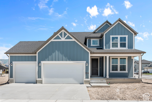 View of front of home featuring a garage