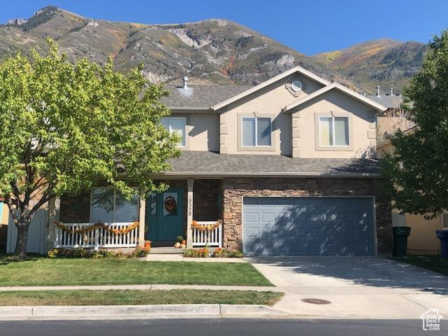 This Gem has a beautiful view of the Valley, Lake and mountains. Flooring, AC, Furnace, Water heater all updated within the last 5 years. Including UV light in the ductwork to help prevent unwanted bacterial growth. This is a beautiful home that has been kept up to date with pride. Backyard has a playset and a portable above ground pool that can stay with the home. Square footage figures are provided as a courtesy estimate only. Buyer is advised to obtain an independent measurement.
