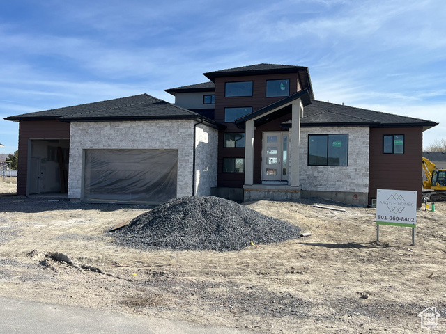 Unique ,Modern, new construction home located on a half acre lot with plenty of room to build your dream yard. This custom home has multiple upgrades and is a must see! Construction should be completed around the middle of May.