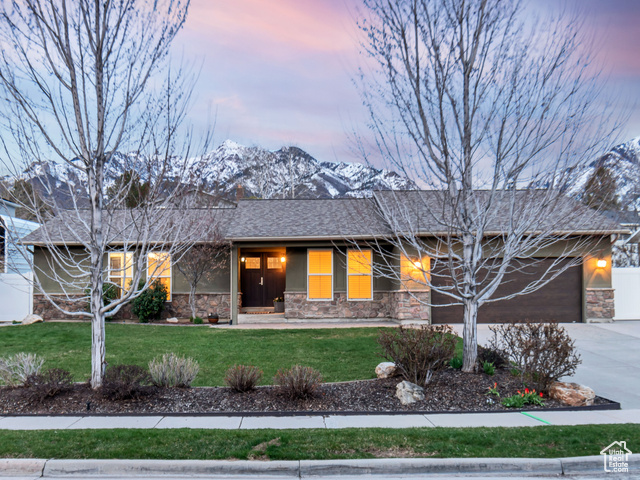 ***PRICE IMPROVEMENT*** Open house Sat May 18th from 1-3 PM. Welcome to this beautiful home just minutes from Big and Little Cottonwood Canyons in Sandy, Utah. This updated rambler offers five bedrooms, 3 bathrooms, a spacious kitchen, and a large family room with a cozy fireplace. The master suite features a walk-in closet and en-suite bathroom. The basement is perfect for family movie nights and includes 2 bedrooms, full bath, storage, and laundry room.  Enjoy outdoor living in the fully landscaped and fenced backyard with a spacious patio and a gorgeous view of the mountains. You will love the location being only minutes from I-215, Wasatch Boulevard, Ft Union and Highland Drive, as well as easy access to shopping, dining, entertainment, and outdoor recreation. Don't miss out on the opportunity to live in this lovely, move in ready home, just waiting for future owners to make it their own. Come check it out, you will not be disappointed! Square footage figures are approximate, and buyer/buyer's agent is encouraged to verify.  Refrigerator in kitchen,  freezer and shelving in garage and patio umbrella are included. Note: some rooms have been virtually staged. Owner related to Agent.