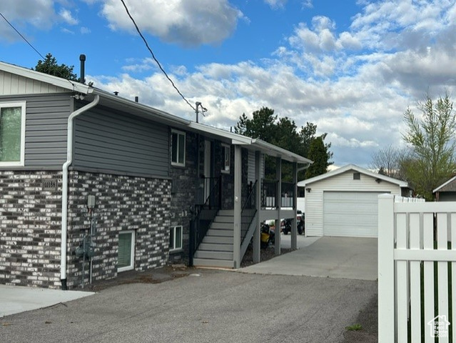 completely remodeled in 2018 with new HVAC,washer & dryer,new plumbing and electrical, and exterior redone in 2020 with new concrete, Roof,stars and deck.  All new paint, flooring, new kitchens.  All new baths.  Great multi generational  home right on 1300 W with a 1 car garage. Does have an mother in law/ADU. Live in the top and rent the basement.