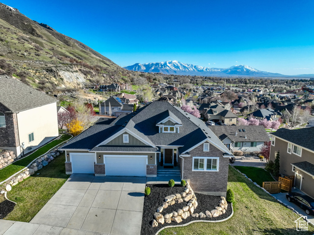 ***Click on "View Tour" for a fab walkthrough video.*** In the coveted Foothill Park community, this Provo beauty is perfectly situated on a peaceful street and close to BYU, the Y, and great walking trails. Enjoy stunning views from both levels and from most windows. Upon entering, you are greeted by a bright and airy living area, complete with large windows that fill the space with natural light. The cozy fireplace adds a touch of warmth and elegance to the room, making it ideal for relaxing or entertaining guests. The kitchen features ample cabinet space, a breakfast bar, and walk-in pantry. The adjacent dining area is perfect for enjoying meals with family and friends. The primary bedroom is a peaceful retreat, boasting a spacious layout and view. Two additional bedrooms offer plenty of space for guests, a home office, or a hobby room. Adding a closet to the den could give you a 5th bedroom. Step outside to the backyard, where you'll find a private oasis. The large patio is perfect for summer barbecues or enjoying morning meditation while taking in the stunning mountain views. Don't miss your chance to make this wonderful property your own! Square footage figures provided as a courtesy estimate only.  Buyer is advised to obtain an independent measurement.