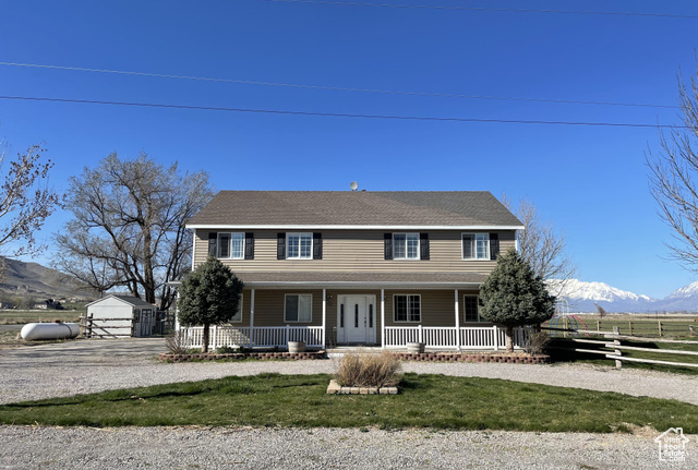 Recently remodeled, 6 bed 4 bath, farm house.  Home was built on a raised lot to avoid water problems, Formerly used as a duplex,  PROPERTY HAS 2,600 SQ FT GARAGE/ WORKSHOP w/ 10 FT & 18 FT CEILINGS. 5 ACRES OF GREENBELT, W/ WATER RIGHTS, WELL,  FARM-ABLE FLAT LAND.