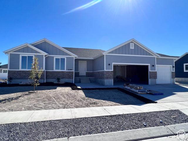 Brand New! 3 car, 3 bed, 2 bath rambler with vaulted ceilings. Model home upgrades!  Soft close cabinets, two tone paint, undermount sinks, tankless water heater, grand master bath, upgraded LVP floor and more. No HOA!