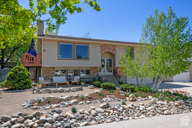 Welcome to your timeless split-level sanctuary in a prime location in the heart of Sandy, UT! This meticulously maintained home offers the perfect blend of comfort, functionality, and outdoor beauty.  Featuring 3 bedrooms and 3 bathrooms-1 full and 2 three-quarter-this home boasts a spacious layout with ample room for your family to spread out and relax. The 100% finished basement provides additional living space and versatility, while the walk-out design adds convenience and easy access to the backyard oasis.  Step inside to discover a welcoming interior with tasteful finishes and an abundance of natural light. The main level features a cozy living area, perfect for unwinding after a long day, while the well-appointed kitchen offers plenty of space for meal prep and entertaining.  One of the highlights of this home is the multiple balconies, providing opportunities to enjoy the fresh air and take in the surrounding mountain views. Whether you're sipping your morning coffee or hosting a summer barbecue, these outdoor spaces are sure to become your favorite spots to relax and unwind.  Outside, the zero-scape front and back yards offer low-maintenance beauty and drought-resistant landscaping, ensuring that you can spend more time enjoying your outdoor spaces and less time on upkeep.  Situated on a generous .20-acre lot, this home provides plenty of room for outdoor activities and recreation. The spacious garage offers ample storage for vehicles and outdoor gear, while the convenient location provides easy access to shopping, dining, and entertainment.  Don't miss out on the opportunity to make this stunning split-level home your own! Schedule a viewing today and experience the perfect blend of indoor comfort and outdoor beauty.  Square footage figures are provided as a courtesy estimate only and were obtained from County Records.  Buyer is advised to obtain an independent measurement.