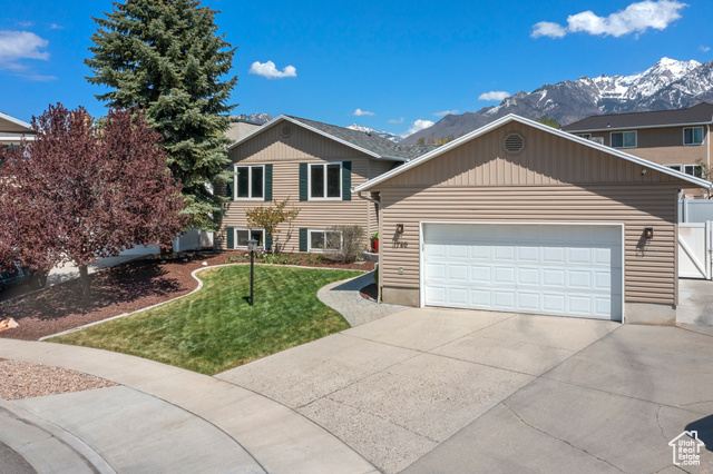 Welcome to this meticulously maintained 6-bed, 3-bath haven in the heart of Sandy's highly desired Falcon Park neighborhood.  This home is nestled in a double cul-de-sac, providing a private retreat from the bustle of everyday life. Enjoy views of the Wasatch Mountains, making it a true sanctuary. Step inside this fully updated home with no detail spared; it's the epitome of turnkey living.  The main level features a large living and dining room perfect for gatherings and an updated kitchen that is a chef's dream-boasting modern appliances, plenty of storage, and counter space. The basement levels offer 3-bedrooms and a large laundry room with a basement entrance for added convenience. Storage abounds in this home, with enough space for all your belongings.  Enjoy peace of mind with a newer roof, newer triple-pane windows bathing the home in natural light, and a newer furnace with a new I-Wave air purifier & humidifier, AC, new water softener, and water heater ensuring comfort year-round. Outside, the large RV space is a bonus for outdoor enthusiasts, complemented by an extra-large fully fenced yard. The yard has fully mature trees and perennials, offering year-round interest and enjoyment. Imagine the possibilities in this outdoor oasis, complete with a multitude of fruit trees and raised garden beds for the green thumb in the family. Easy access to outdoor recreation, including hiking, biking, and skiing in the nearby Wasatch Mountains. The area is also known for its top-rated schools, bustling shopping centers, and diverse dining options, providing the perfect balance of convenience and leisure. Don't miss your chance to own this Sandy gem-schedule a showing today and experience the best of comfortable, modern living with breathtaking views.  Square footage figures are provided as a courtesy estimate only and were obtained from county records. The buyer is advised to obtain an independent measurement.