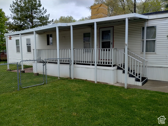 Cute and roomy manufactured home in a quiet Sandy neighborhood.  Lot rent is lower than most parks at $880/mo and includes water, sewer, garbage and snow removal.  2 large bedrooms and 2 bathrooms. The 2nd bedroom could be divided to make a 3rd bedroom as it was originally. Stainless steel refrigerator, gas stove, dishwasher and microwave.  2 car carport. Doggie door to the fully fenced yard.  Tile flooring in the kitchen and bathrooms.  Pet restrictions apply.