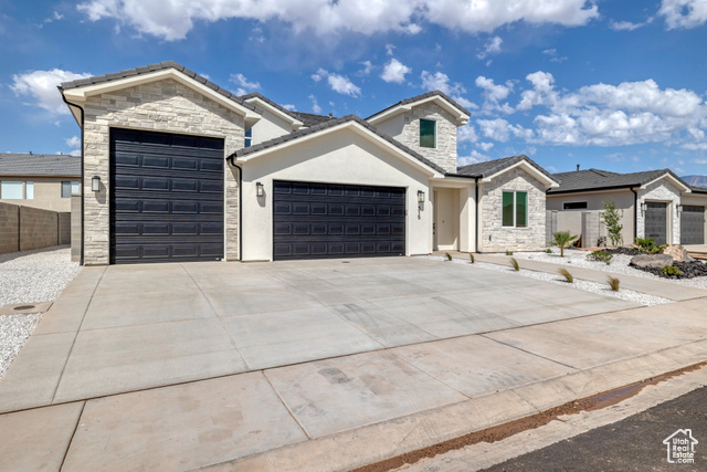 Xeriscape yard with RV Garage