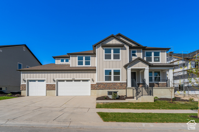 View of front of property with a garage