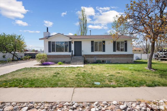 LOCATION, UTILITY, BEAUTY!!! This home is a MUST-SEE if you are looking to live in southern Utah county! This gorgeous rambler has 5 beds and 2 baths, 2160 square feet of living space, and a lovely quarter acre corner lot, with both up and downstairs living areas. Let's start with LOCATION. Three minutes away from the freeway entrance nestled on quiet street in a peaceful neighborhood. Just off of eight-hundred south, means walking distance from almost a dozen fast food joints, cafes, diners, and local drive-ins. Within a seven-minute drive is another almost dozen places to eat. A five-minute drive will take you to Memorial Park or the Peteetneet Academy & Museum. Head just up the road to hit Salem Pond or down to Spring Lake. Jump on the freeway and go play in Mona Reservoir. Nestled right near the mouth of Picayune, Crooked, and Payson Canyons and in the shadow of the beautiful Payson Utah Temple. This area is ready and happy to suit all ages and lifestyles. Moving on to UTILITY. Between the bedrooms, living space, kitchen, and large corner lot, this home has been customized for maximum usage and storage. Backyard includes shed, playground set, and workout equipment. Large sized gate gives rear parking for vehicles or trailers. Side yard great for extra parking or add personalized landscaping and gardening. Each closet has customized shelving that matches the kitchen. 5 bedrooms means lots of living space for everyone or spread out with storage, offices, fitness rooms, or studios. Stove-style wood-burning stove is extremely effective in heating your home, or just use it for those cozy nights with a book. Fireproof brick on wall and floor for total peace of mind. Cold storage room downstairs gives plenty of space for anything else that needs to be stored, hidden away, or packed seasonally. Finishing off with beauty. First thing you'll noticed is the freshly remodeled kitchen. Downstairs bathroom is also brand new. Roof was done within the last five years. Previously mentioned exposed brick in basement, with the gorgeous fireplace, matches the exterior brick and exposed iron style in the kitchen. Brick and white siding go together flawlessly and timelessly. Color, style, and design reflects the care and thoughtfulness that comes from the last owners that enjoyed this home. Size and uniqueness of this home, with the incredible affordability, will not be found anywhere else in Utah County. Please, come by, see for yourself, and become the proud new owner of this gorgeous Payson location. Square footage figures are provided as a courtesy estimate only. Buyer is advised to obtain an independent measurement.