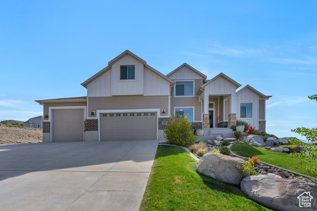 Welcome to this beautiful custom built home that checks all the boxes! With unparalleled views of mountains from all sides and breathtaking Utah Lake, you won't be disappointed. The large yard boasts a full, standard size PickleBall Court that was poured last fall, large patio, and room for animals, outbuildings, or whatever you could dream up! This home features a main floor master suite, has a double sink and a large walk-in closet. The open concept family room has beautiful custom built-ins and vaulted ceilings, with top to bottom windows and custom shades. Large kitchen boasts double ovens and granite counter tops - in fact, all of the counters in the home are granite!   The Mother-in-law apartment in basement is very large and has its own washer/dryer, full kitchen, and driveway/entrance. This is a must see home with BRAND NEW CARPET throughout.   Square footage figures are provided as a courtesy estimate only and were obtained from County Records .  Buyer is advised to obtain an independent measurement.