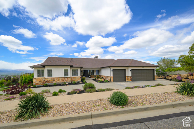**OPEN HOUSE THIS SATURDAY FROM 11:00am - 1:00pm** Located in the desirable Pheasant Hills neighborhood of Draper, this Custom Rambler offers an oasis of comfort and elegance. Situated on one of Draper's most coveted .45 acre view lots, this home boasts panoramic vistas throughout. The main floor showcases 22-foot vaulted ceilings and abundant windows, inviting natural light to fill the space. Step outside to the expansive deck, perfect for al fresco dining or relaxing while enjoying the stunning surroundings. The primary suite is a haven of tranquility, featuring a spa-like ensuite bathroom with dual vanities, a soaking tub, and a marble walk-in shower. Main floor living includes three generously sized bedrooms, a laundry room, office/den, formal dining, living and family rooms, and an updated kitchen. Downstairs, the walk- out basement offers a second primary suite, a spacious bathroom, and a large family room. Ample storage and the potential to add additional bedrooms provide flexibility for future needs. Residents benefit from a low annual HOA fee, which grants access to a beautifully maintained pool area and a pickle-ball court, adding to the overall lifestyle appeal of this exceptional home.  Conveniently located near some of the best schools in Utah including Corner Canyon High School and Juan Diego, this home offers many opportunities for the future owner.  Schedule your private viewing today and seize the opportunity to make this amazing property your own.