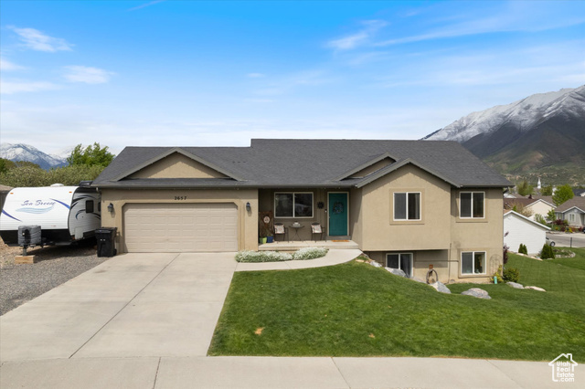 Welcome to your dream home nestled in the heart of Spanish Fork! This charming rambler offers the perfect blend of comfort and tranquility, with breathtaking mountain views that will leave you in awe every day. Key Features: 4 bedrooms, providing ample space for the whole family or guests. 2 bathrooms, ensuring convenience and privacy. Spacious living areas, ideal for entertaining or simply relaxing by the fireplace. Large windows throughout, allowing natural light to flood the interior and offering uninterrupted views of the surrounding mountains. Outdoor patio, perfect for enjoying morning coffee or evening stargazing against the backdrop of majestic peaks. Serene location, offering peace and quiet while still being within easy reach of amenities and outdoor recreational activities. Don't miss out on the opportunity to make this picturesque retreat your own! Schedule a viewing today and experience the magic of mountain living firsthand.   Square footage figures are provided as a courtesy estimate only and were obtained from county records .  Buyer is advised to obtain an independent measurement.
