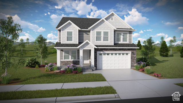 Craftsman-style home featuring a front lawn and a garage