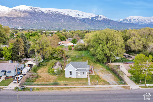 Great opportunity in the heart of American Fork. Remodel your starter home or build your dream home! This spacious lot is zoned for one single family unit or one 2 dwelling unit with a shared wall.