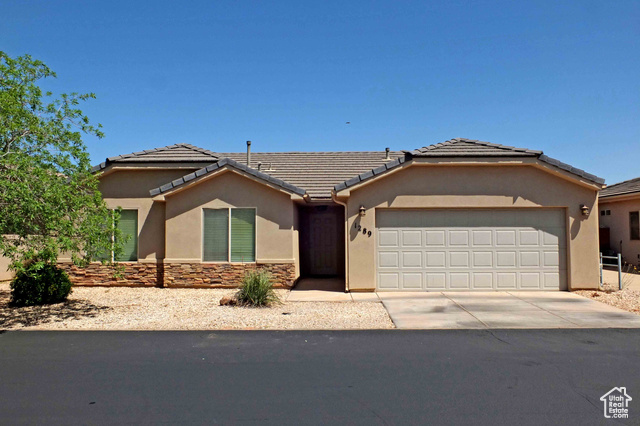 View of front of home with a garage