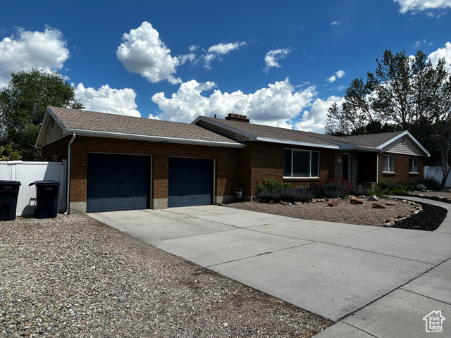 Beautiful Remodeled Brick Home in Sandy. This 2,545 sq. ft. brick home on a .35-acre lot in Sandy, UT, has been completely remodeled upstairs. The home features a cozy fireplace, roof is 11 years old, RV parking, and a 2-car garage. The front yard is xeriscaped for easy maintenance. Located across the street from baseball fields, pickleball, and tennis courts, and just a 2-minute walk to a walking/bike path. Close to shopping and entertainment. Don't miss this gem! Contact us today for a viewing. Buyer to verify listing information and square footage.