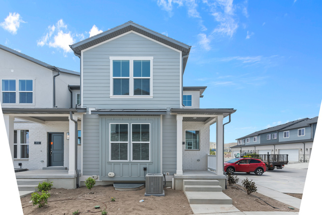 Front facade featuring central AC and a garage