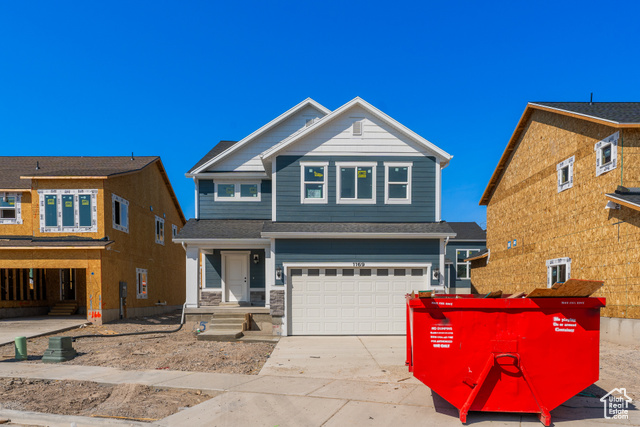 View of front of home with a garage