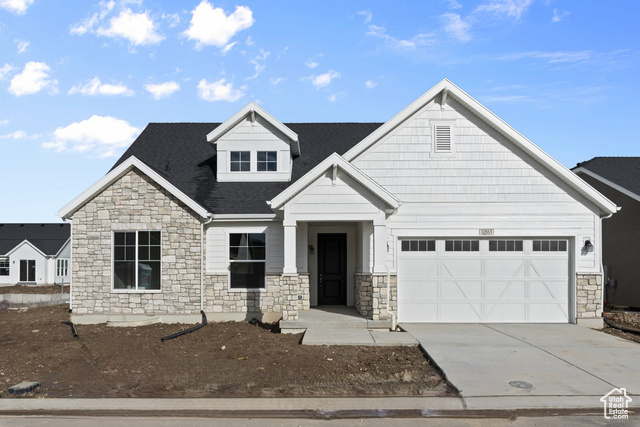 View of front of house with a garage