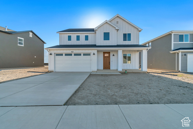 View of front of property with a garage