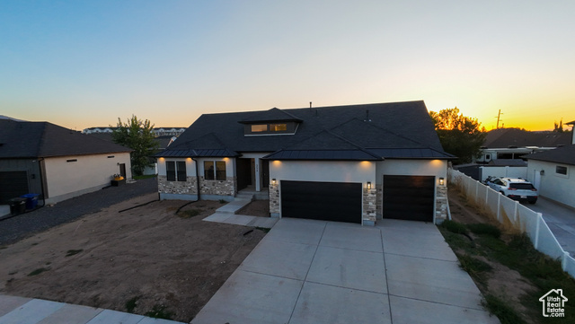 View of front of home with a garage