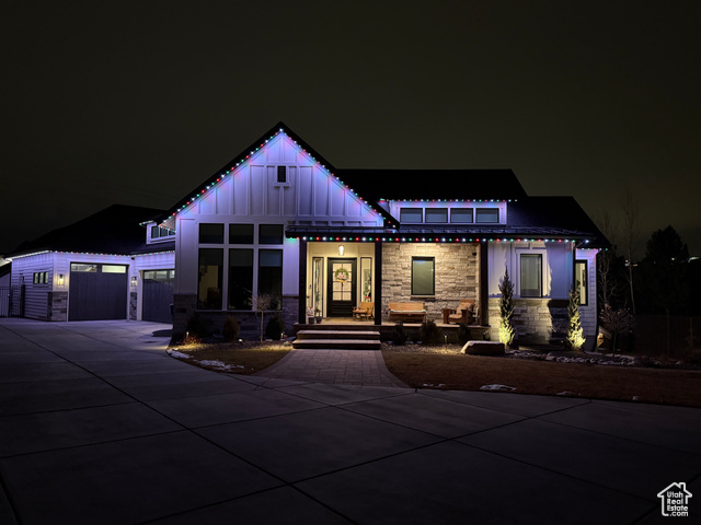 View of front of property featuring a garage